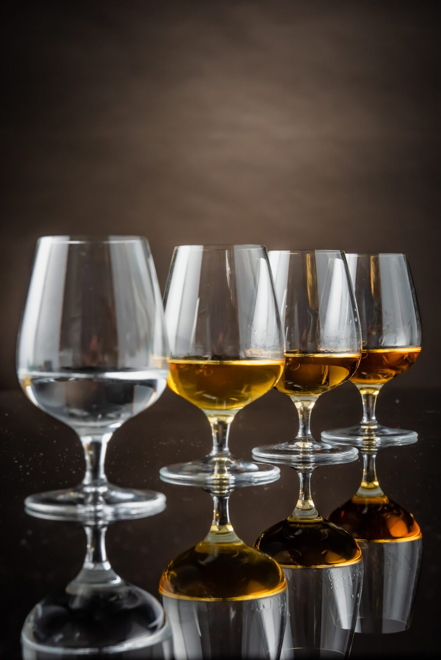 A group of wine glasses sitting on top of a table.